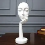 Homeko in Thought Statues