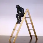 Homeko in Thought Thinker on Stairs