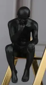 Homeko in Thought Thinker on Stairs