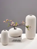 Homeko in White Vase