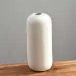 Homeko in White Vase