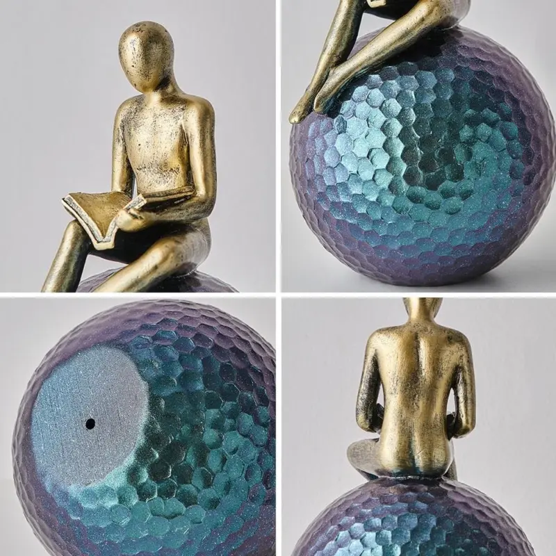 Man On Sphere Sculpture