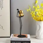 MetalHoldTheBallFigurine Homeko4