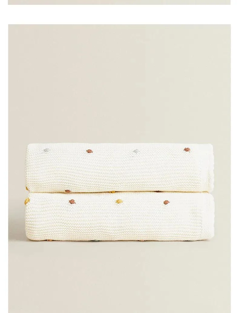 Nordic Pompom Baby Blanket: Cozy and Adorable -