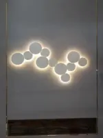 PUCK WALL ART Fluorescent wall light