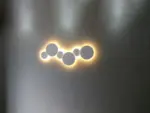 PUCK WALL ART Fluorescent wall light