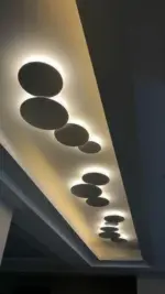 PUCK WALL ART Fluorescent wall light