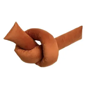The knotted velvet cushion: Luxurious velvet cushion with knotted design