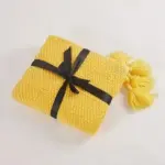 Cosy woollen knitted tassel sofa blanket