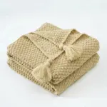 Cosy woollen knitted tassel sofa blanket