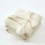 Cosy woollen knitted tassel sofa blanket