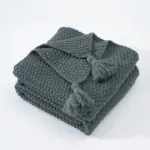 Cosy woollen knitted tassel sofa blanket