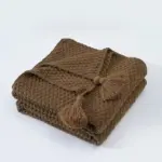 Cosy woollen knitted tassel sofa blanket