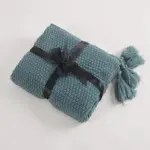 Cosy woollen knitted tassel sofa blanket