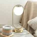 Goldene design tischlampe george milchglas