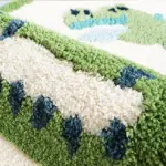 Green dinosaur rug