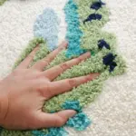Green dinosaur rug