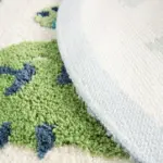 Green dinosaur rug