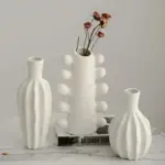Minimalist unglazed ceramic vase