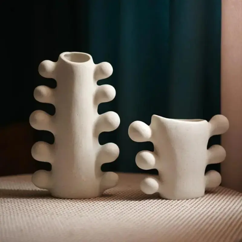 Minimalist unglazed ceramic vase