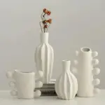 Minimalist unglazed ceramic vase