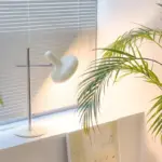 Modern white glass disc table lamp