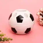 Novelty football shaped desktop organiser