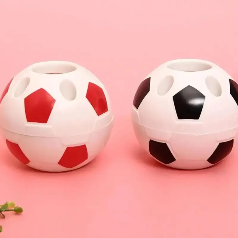 Novelty football shaped desktop organiser
