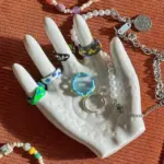Palm shaped ceramic ring collection storage holder