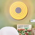 Pastel coloured concentric wall lamp