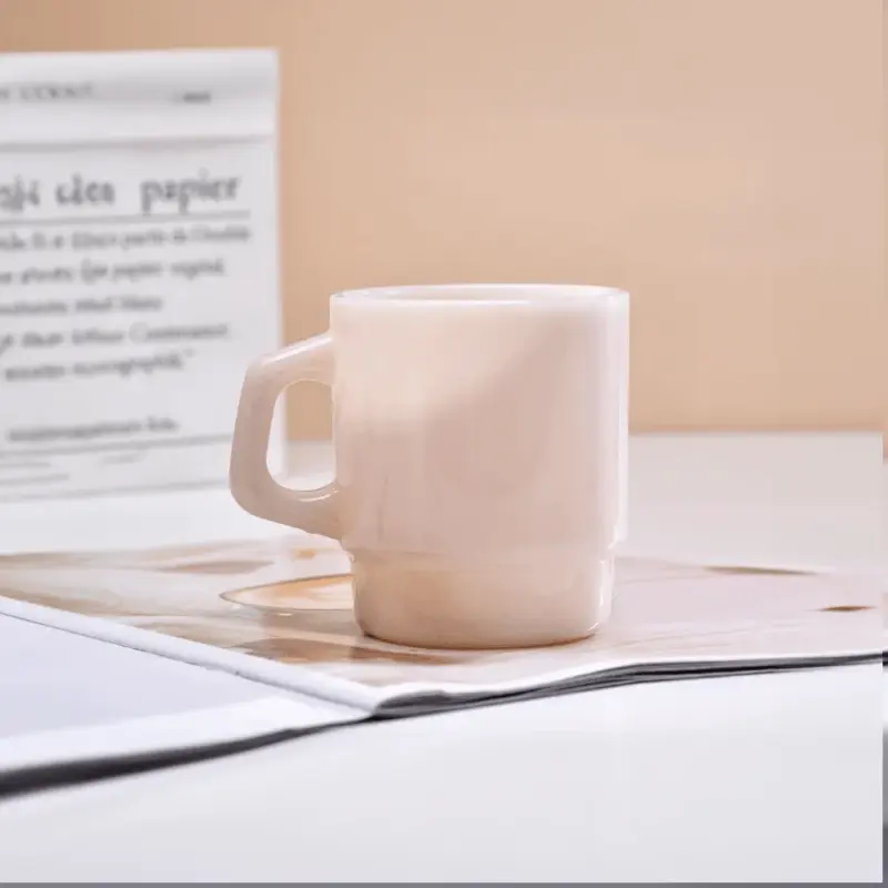 Pastel coloured stackable glass mug