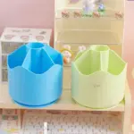 Pastel rotating stationery organiser