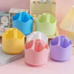 Pastel rotating stationery organiser