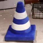 Plush traffic cone cosy cushion