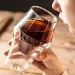 Quirky double layered heat resistant glass cup