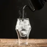 Quirky double layered heat resistant glass cup
