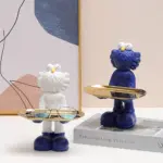 Quirky figurine statue with storage tray