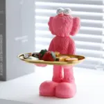 Quirky figurine statue with storage tray