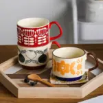 Retro style colourful stackable coffee mug
