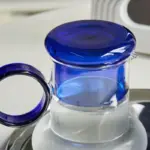 Retro style glass pitcher with lid matching cup