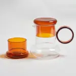Retro style glass pitcher with lid matching cup