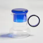 Retro style glass pitcher with lid matching cup