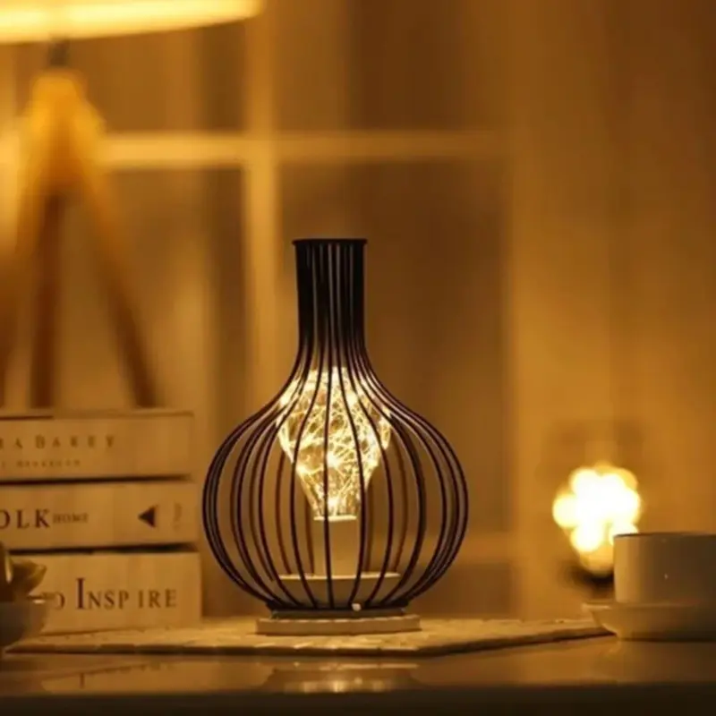 Retroera minimalistische hohle Tischlampe xlumina