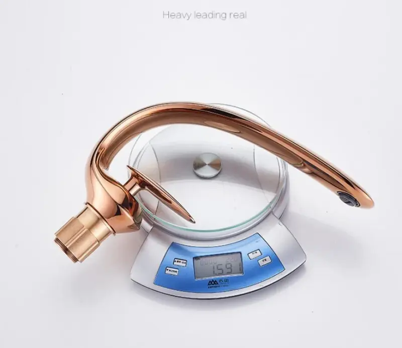Rose gold minimalistic sink faucet