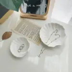 Shell shaped white ceramic jewellery tray
