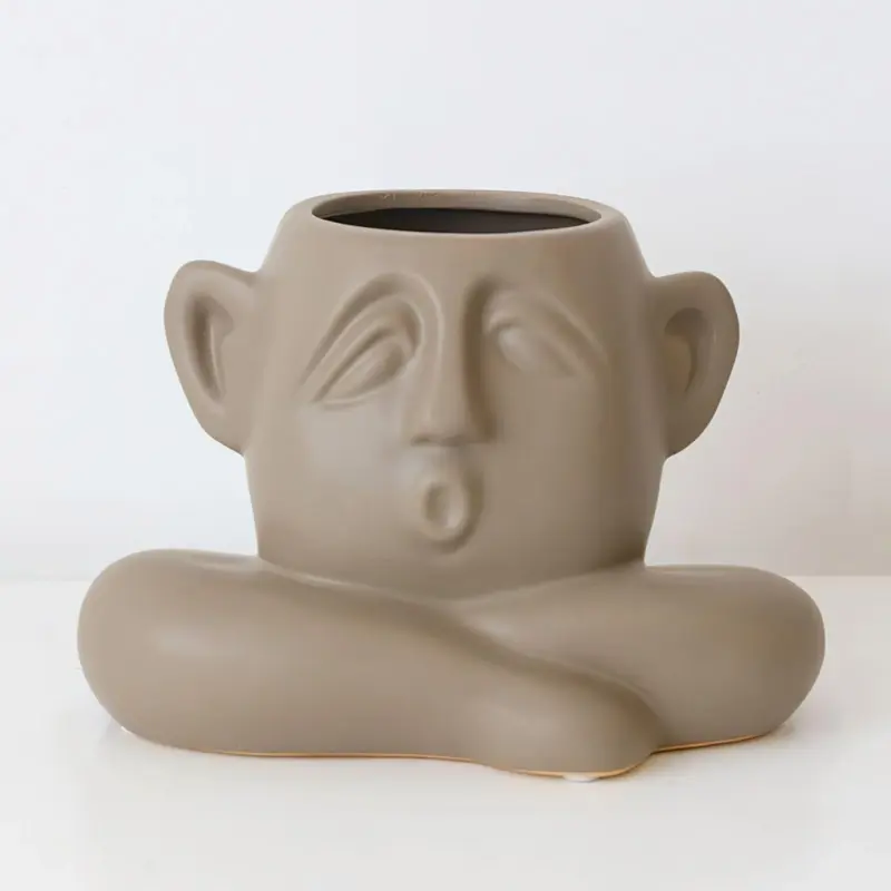 Sleepy face vasesornamentalliving simply house