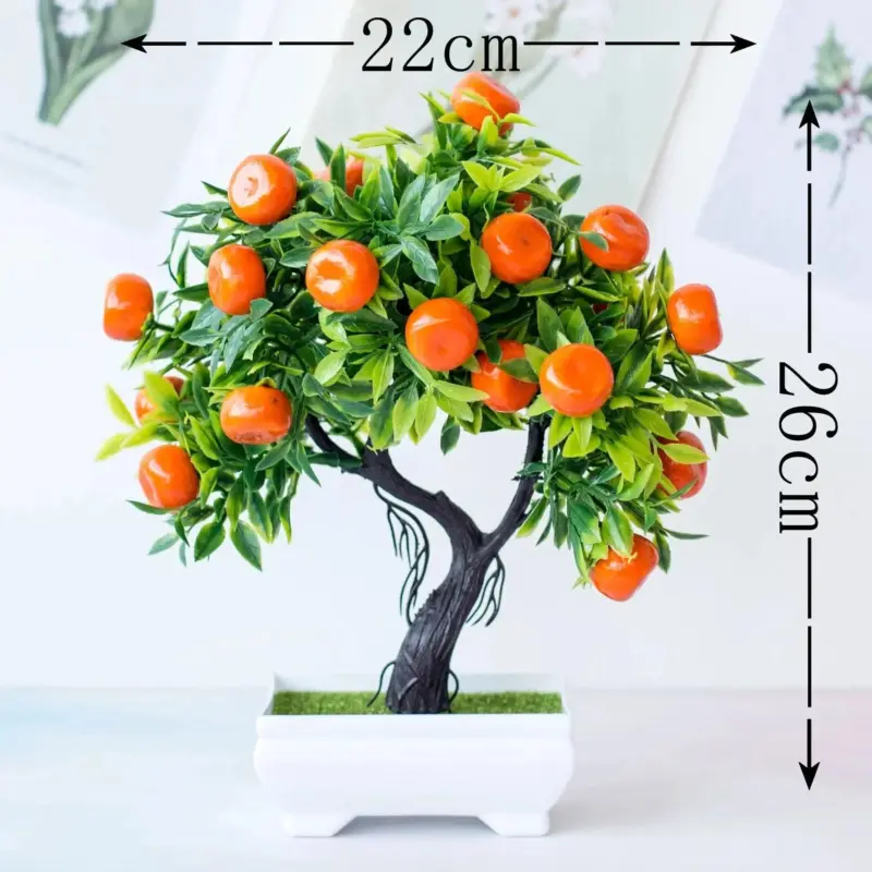 Small artificial potted bonsai fruit tree