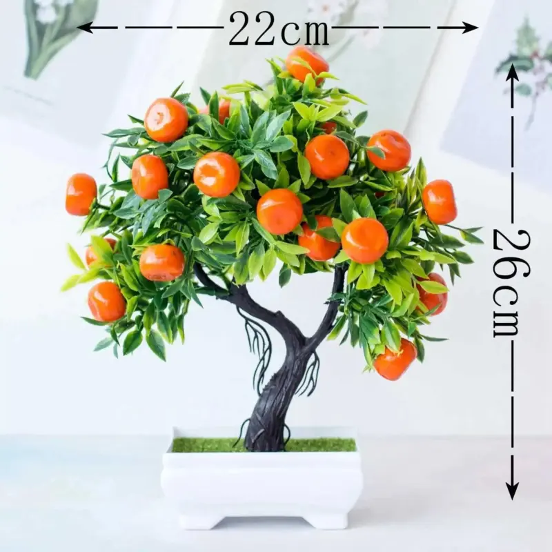 Small artificial potted bonsai fruit tree