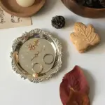Small round metal or glass decorative tray
