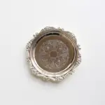 Small round metal or glass decorative tray